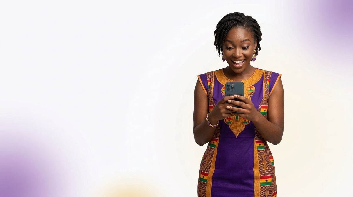 Smiling woman in a purple kente dress shopping on her phone